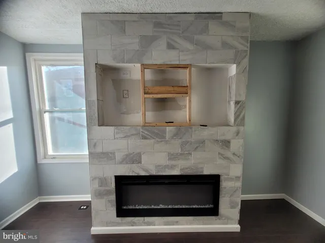 a room with a fireplace