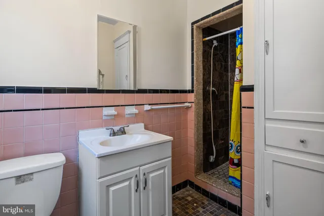 a bathroom with a sink and a toilet