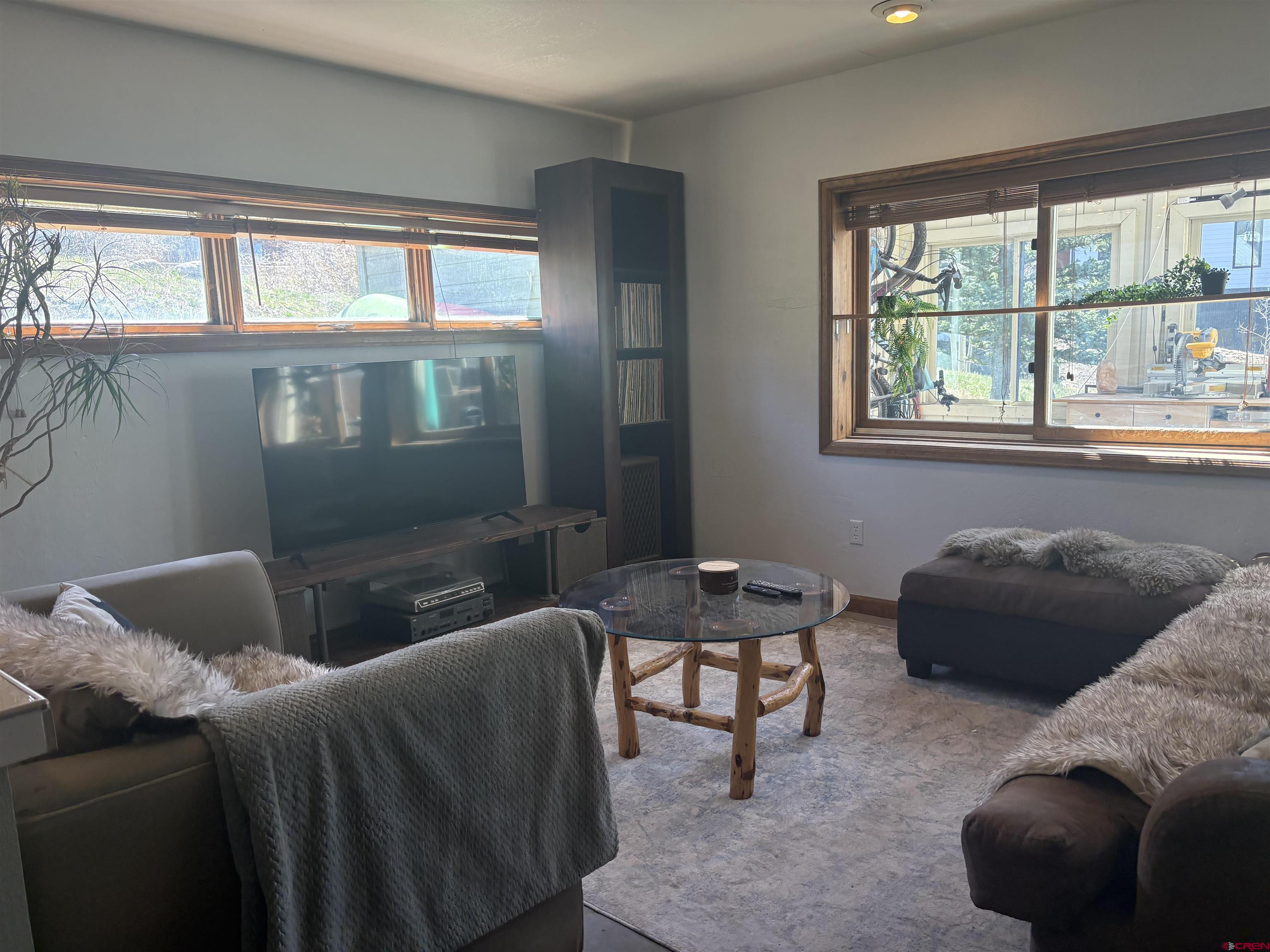 26 Castle Road, Unit 3 Crested Butte, CO 81225 - Photo 15 of 32 a living room with furniture and a window