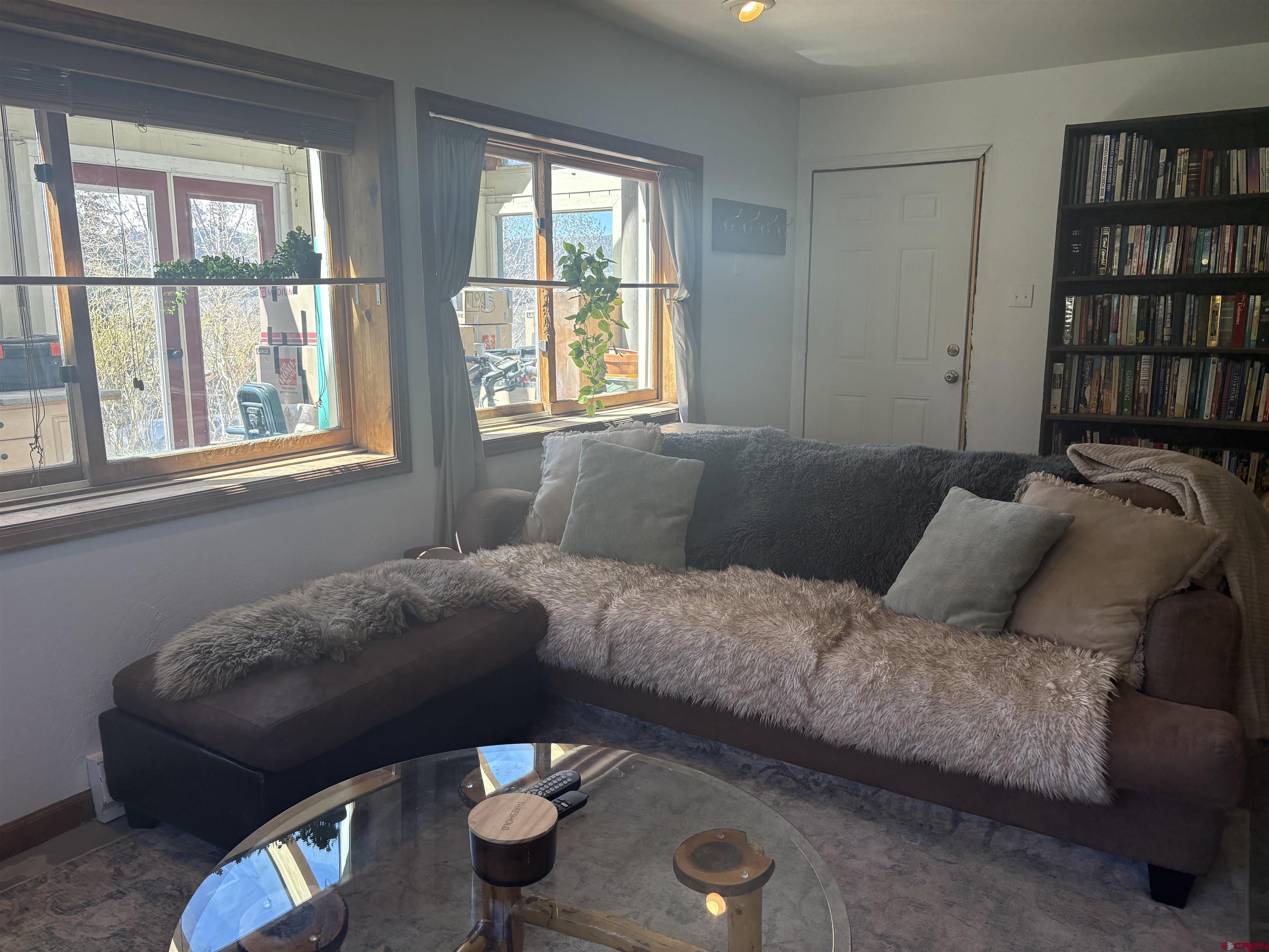 26 Castle Road, Unit 3 Crested Butte, CO 81225 - Photo 18 of 32 a living room with furniture and a window