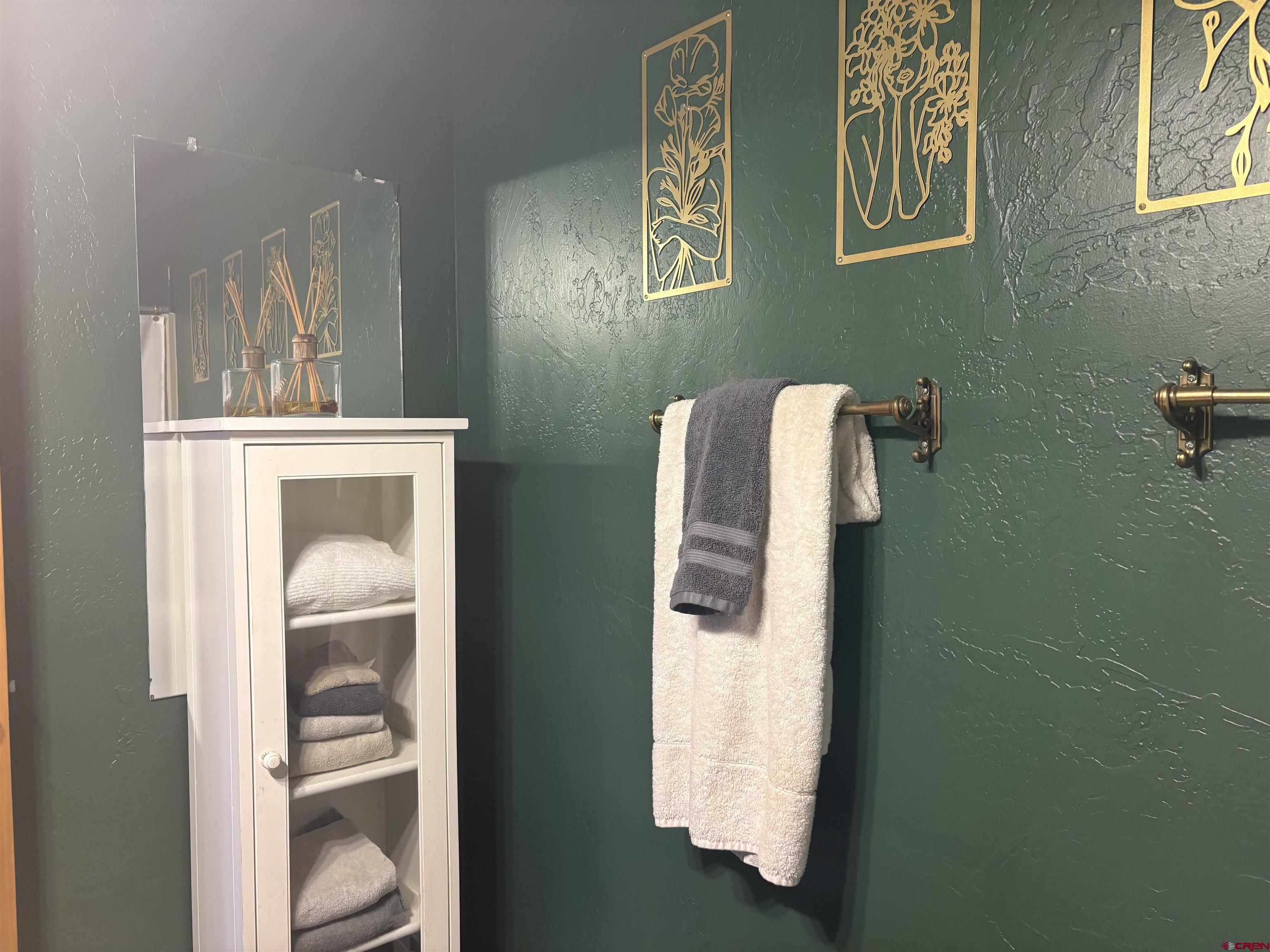 26 Castle Road, Unit 3 Crested Butte, CO 81225 - Photo 20 of 32 a bathroom with a bathtub and shower