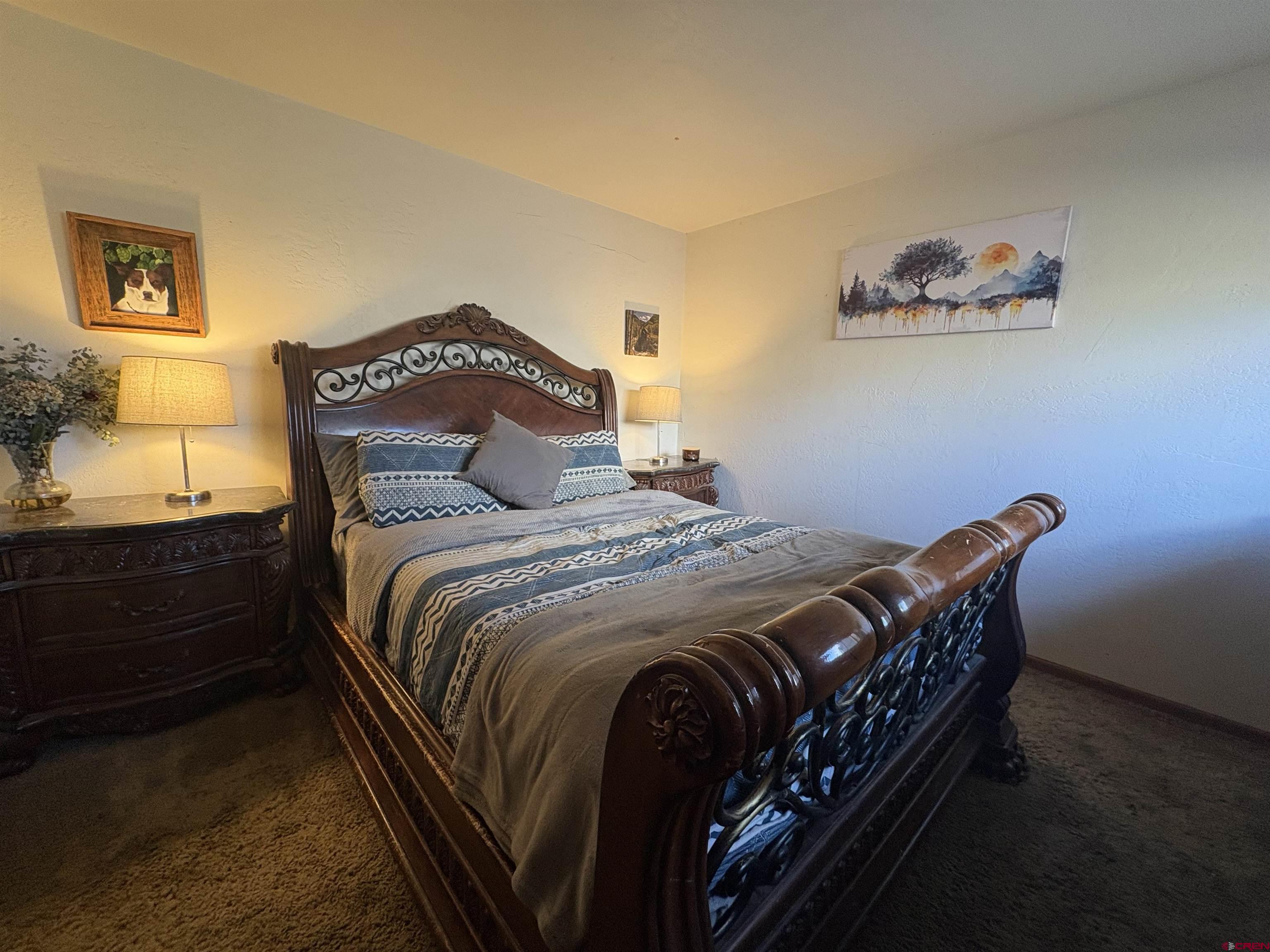 26 Castle Road, Unit 3 Crested Butte, CO 81225 - Photo 24 of 32 a bedroom with a bed and a window