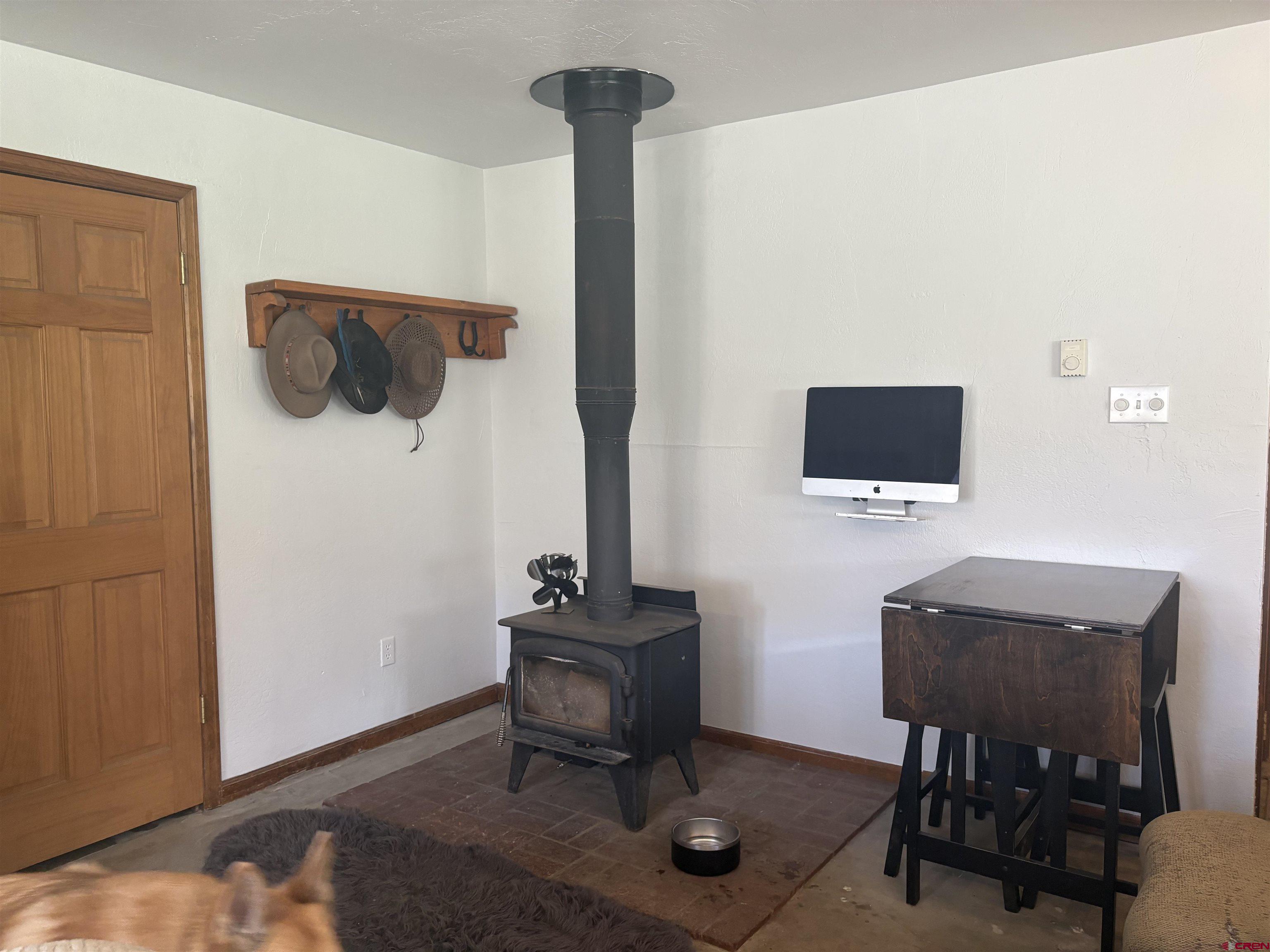 26 Castle Road, Unit 3 Crested Butte, CO 81225 - Photo 9 of 32 a living room with furniture and a flat screen tv