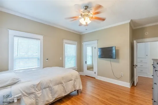 a room with furniture and flat screen tv