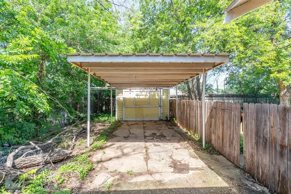 a house with trees in the background