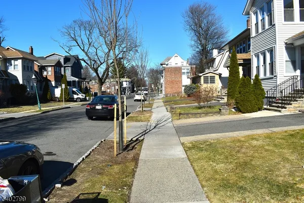 a view of a street with houses