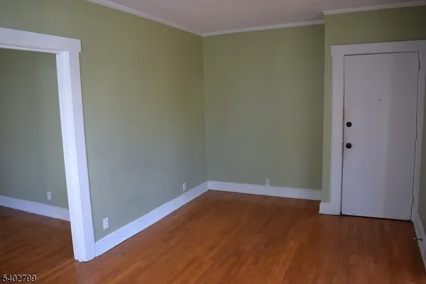 a view of small space with wooden floor