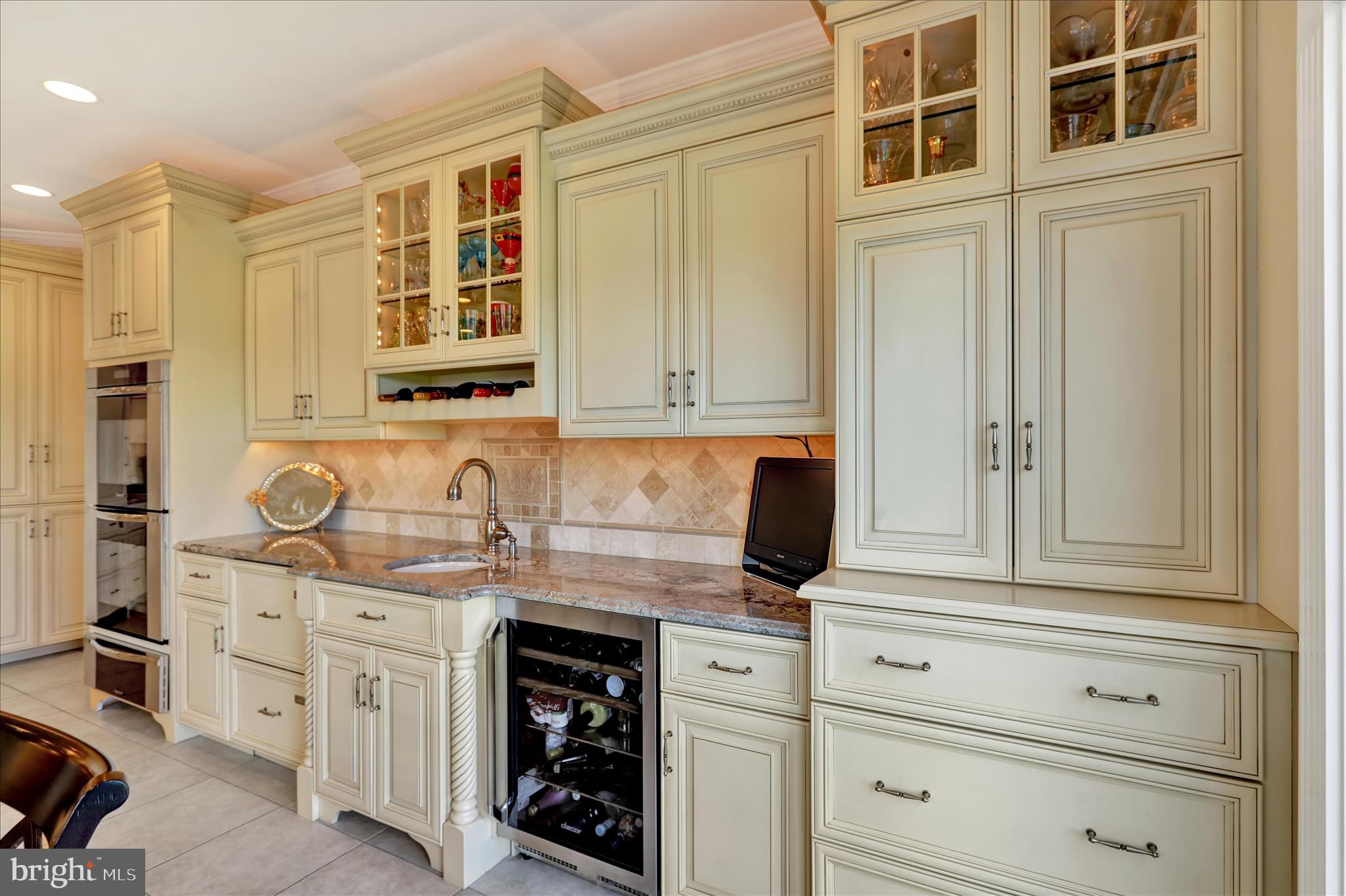 1000 Bluestone Drive Lititz, PA 17543 - Photo 61 of 132 a kitchen with stainless steel appliances granite countertop white cabinets and sink