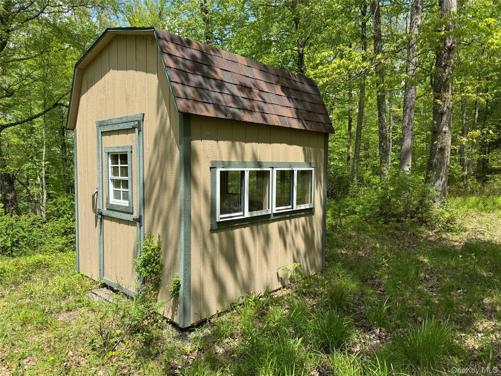 632 New Turnpike Road Cochecton, NY 12726 - Photo 18 of 28 a view of a house with a yard