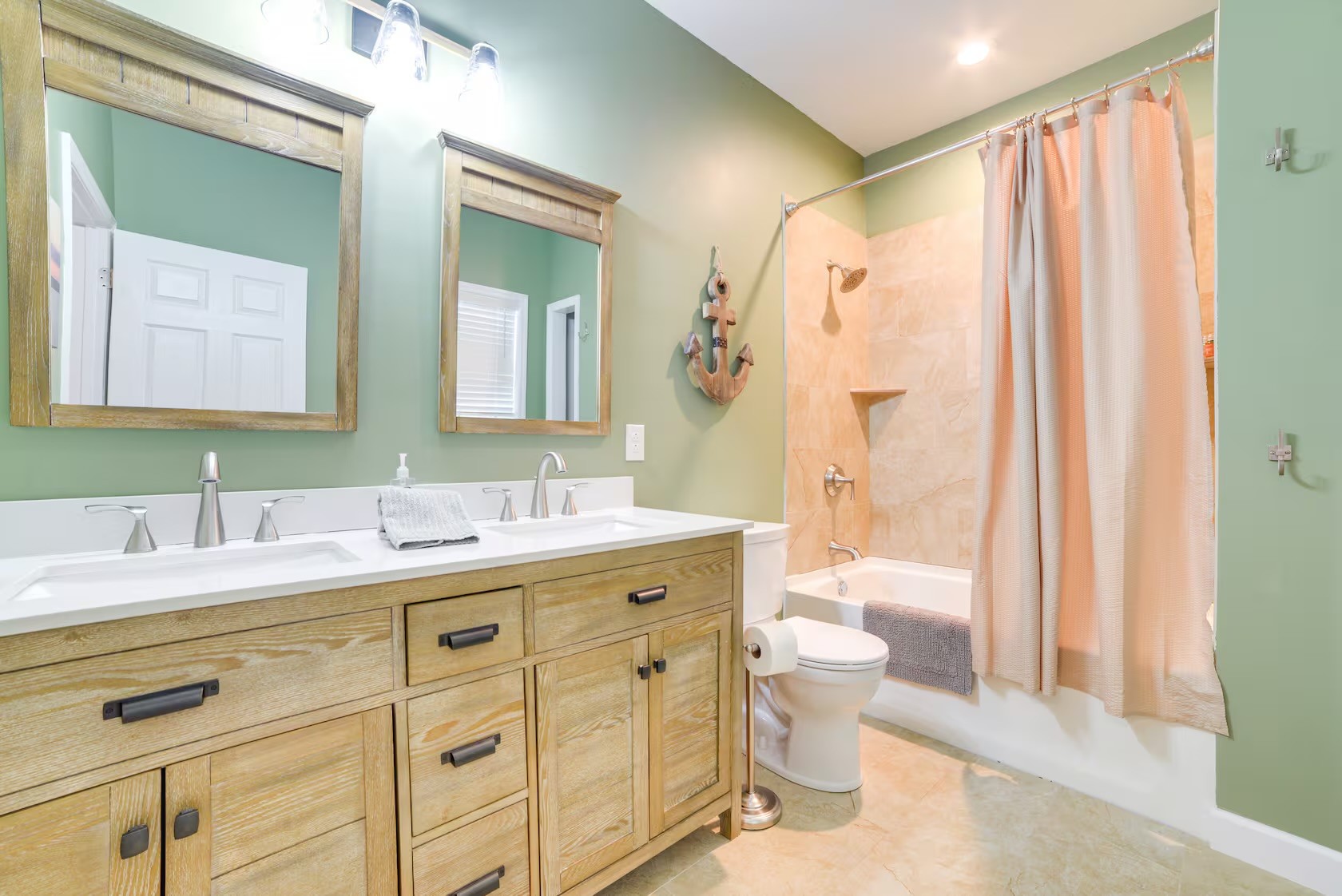 3010 Highwater Road Waverly, TN 37185 - Photo 16 of 29 a bathroom with a double vanity sink mirror and toilet