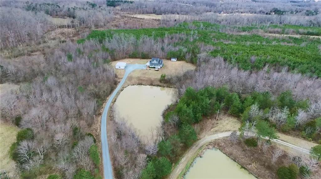 6052 David Moore Road Elon, NC 27244 - Photo 1 of 30 SPECTACULAR 8.5 acre lot with 2116 sq ft two level home