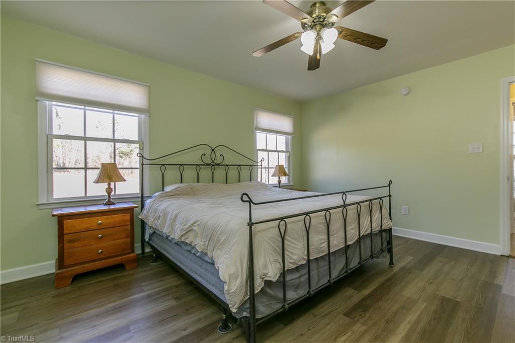 6052 David Moore Road Elon, NC 27244 - Photo 12 of 30 Loads of natural light and awesome views of side yard