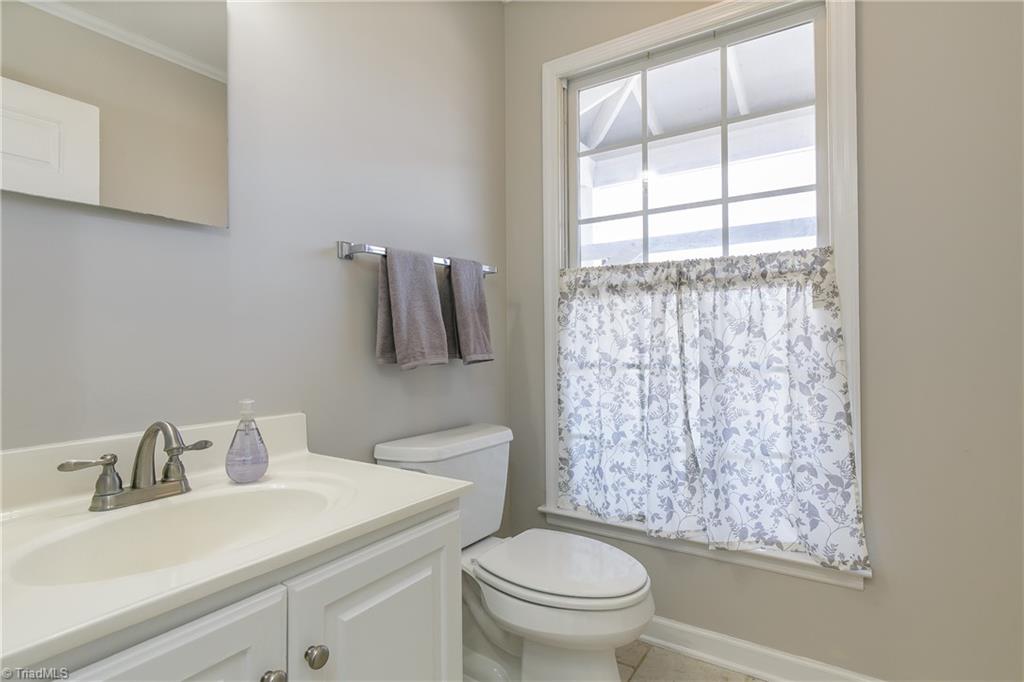 6052 David Moore Road Elon, NC 27244 - Photo 15 of 30 Half bath off entry is convenient and lovely