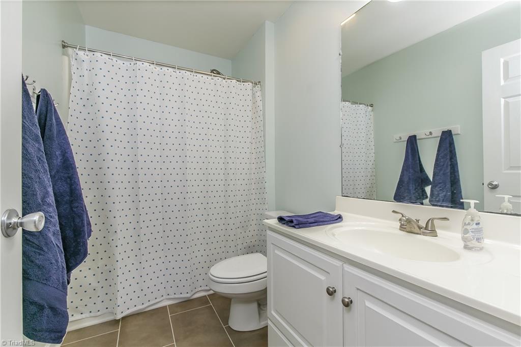 6052 David Moore Road Elon, NC 27244 - Photo 17 of 30 Shower tub combination in this upstairs full bath