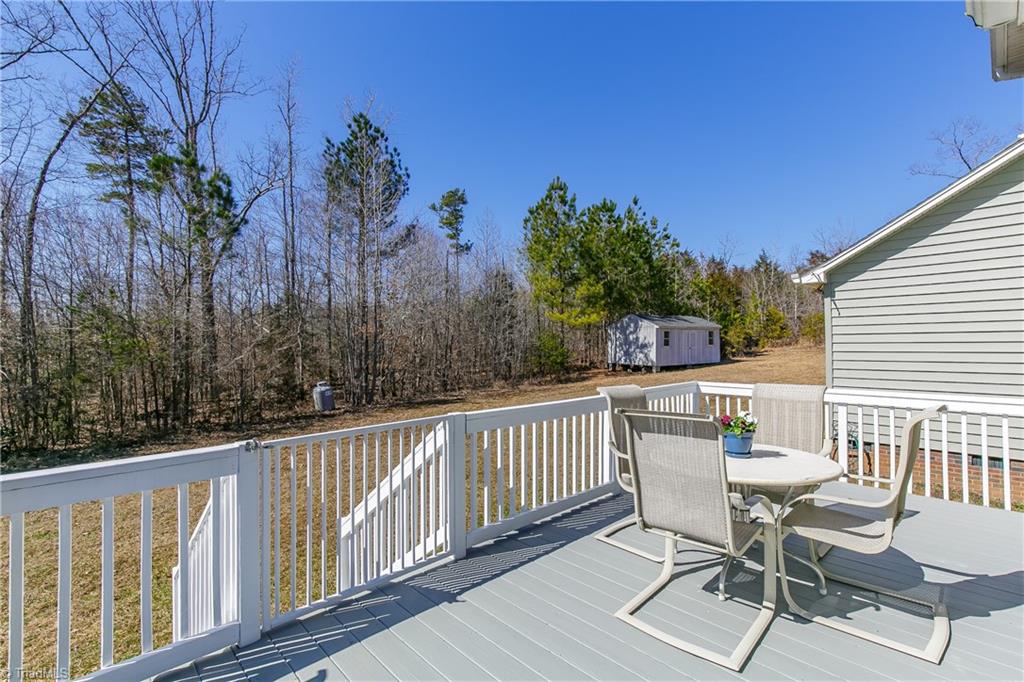6052 David Moore Road Elon, NC 27244 - Photo 24 of 30 Three sets of steps to enter/exit easily from any part of the yard