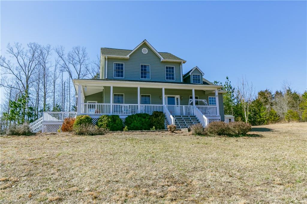 6052 David Moore Road Elon, NC 27244 - Photo 4 of 30 WRAP around porch in this 3 bedroom, 2 bath home