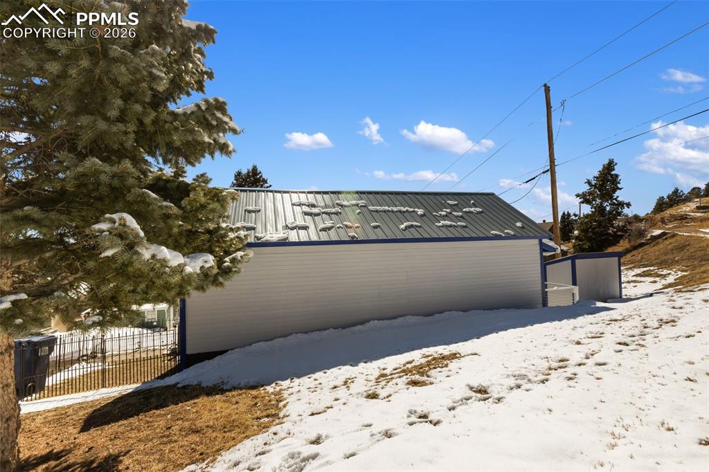 209 5th Street Victor, CO 80860 - Photo 24 of 36 a view of a terrace with a snow