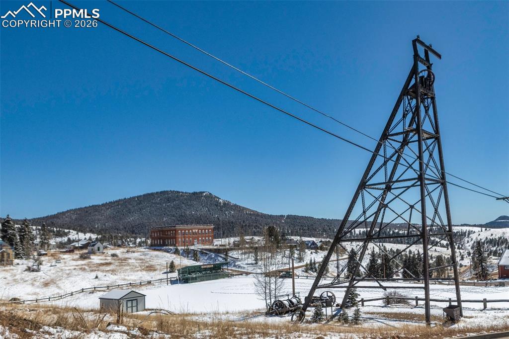 209 5th Street Victor, CO 80860 - Photo 29 of 36 a view of a lake with a mountain in the background