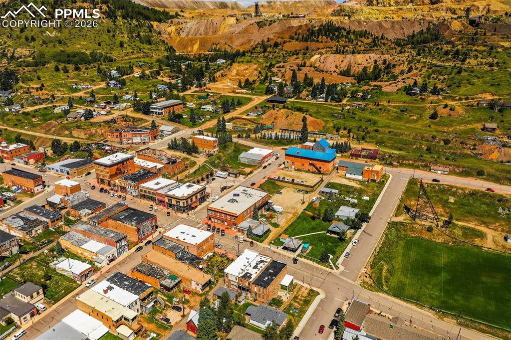 209 5th Street Victor, CO 80860 - Photo 33 of 36 an aerial view of residential houses with outdoor space