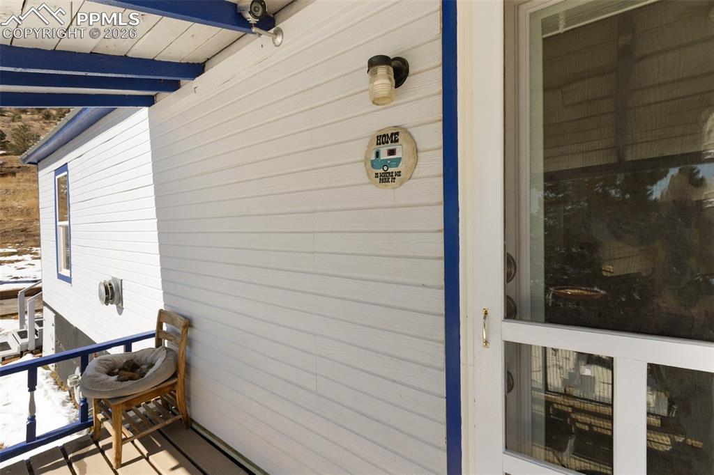 209 5th Street Victor, CO 80860 - Photo 7 of 36 a bathroom with a toilet and a shower