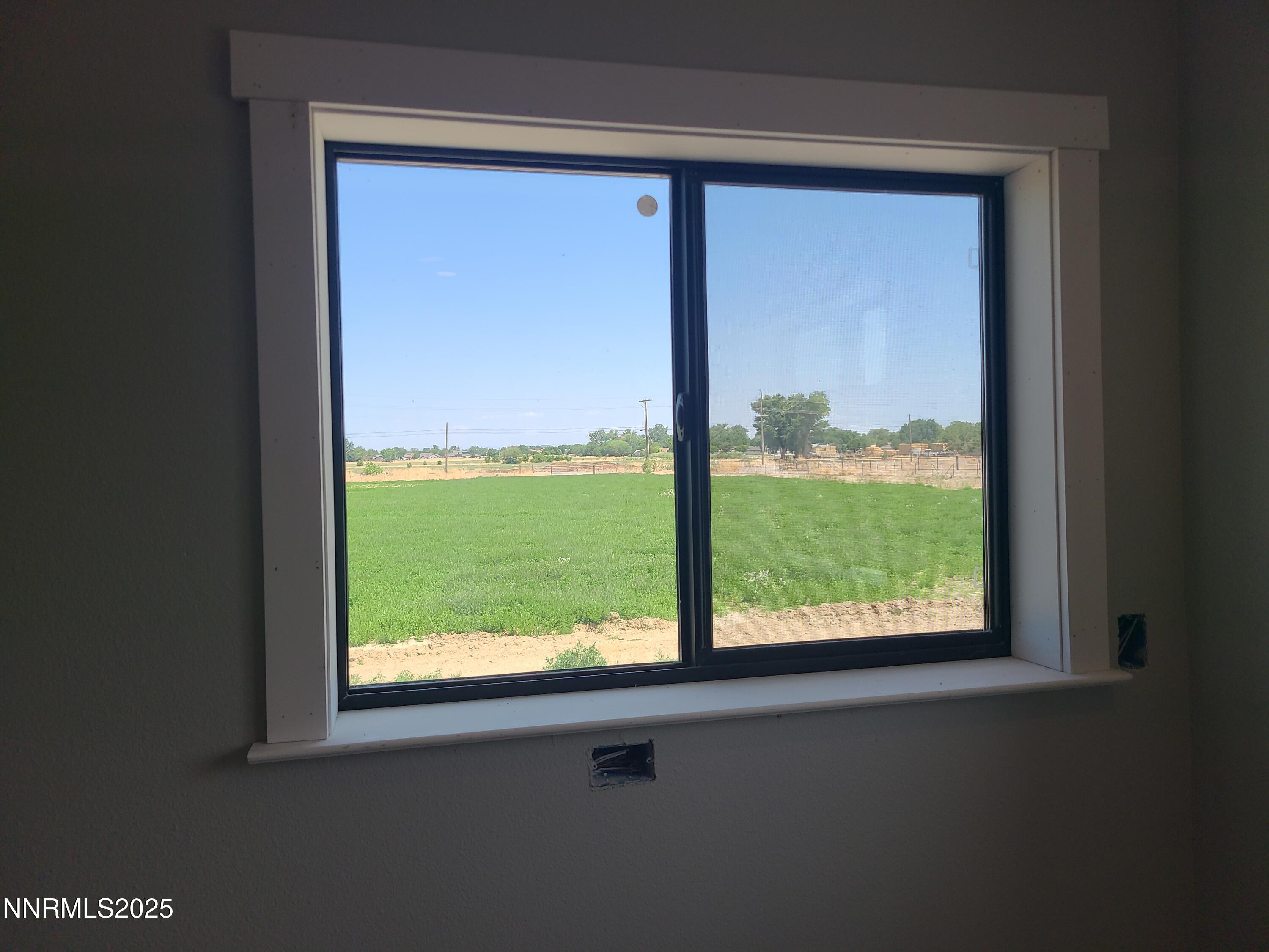 900 Cattle Circle Fernley, NV 89408 - Photo 16 of 21 TOM KITCHEN WINDOW TO FIELD 25