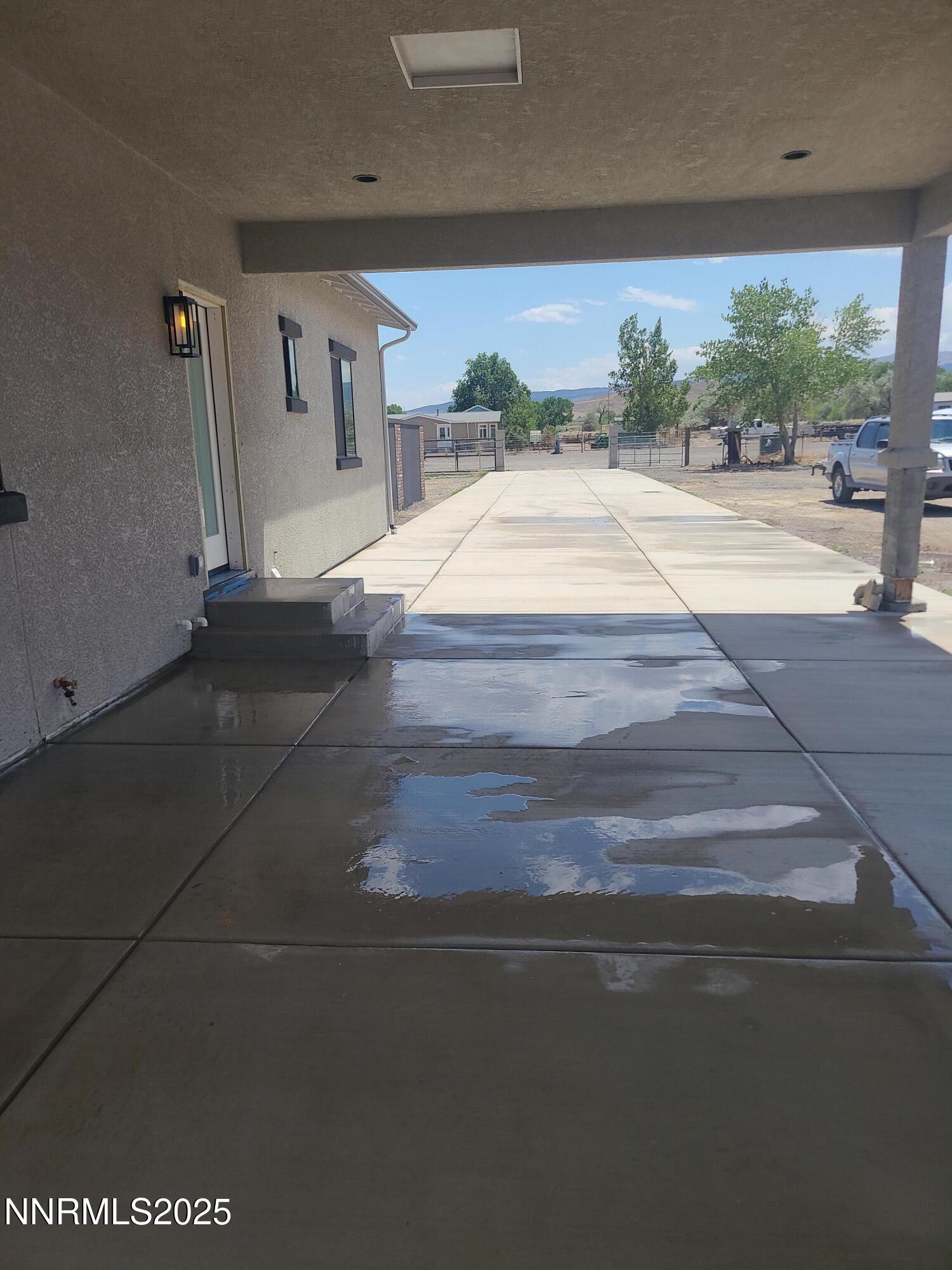 900 Cattle Circle Fernley, NV 89408 - Photo 4 of 21 TOM CARPORT CEMENT DRIVEWAY 25