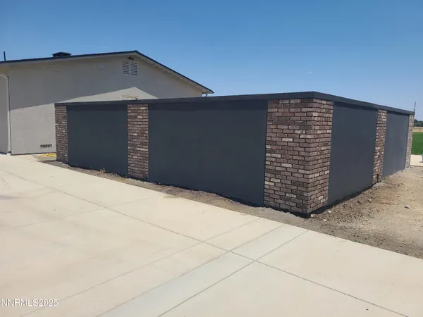 a front view of a house with garage