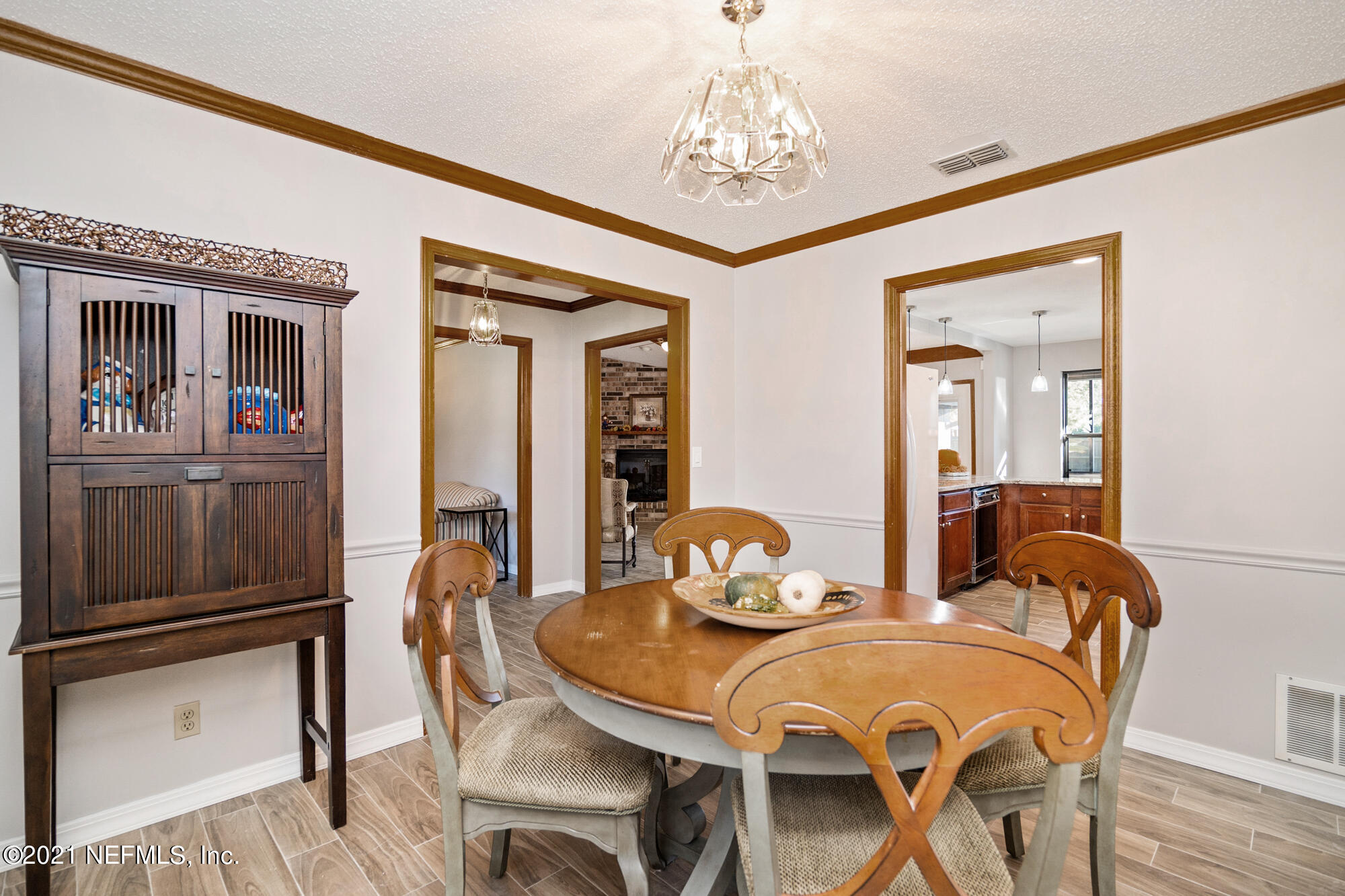 5210 Riverton Road Jacksonville, FL 32277 - Photo 11 of 43 Dining to Foyer & Kitchen