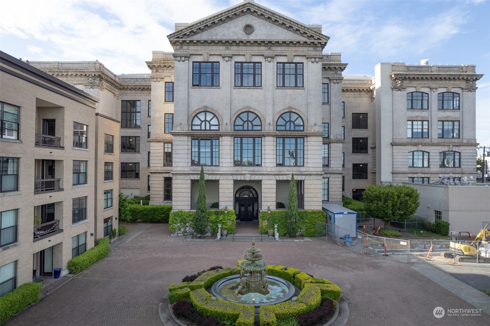 201 Galer Street, Unit 334 Seattle, WA 98109 - Photo 17 of 19 a front view of a building with garden and plants