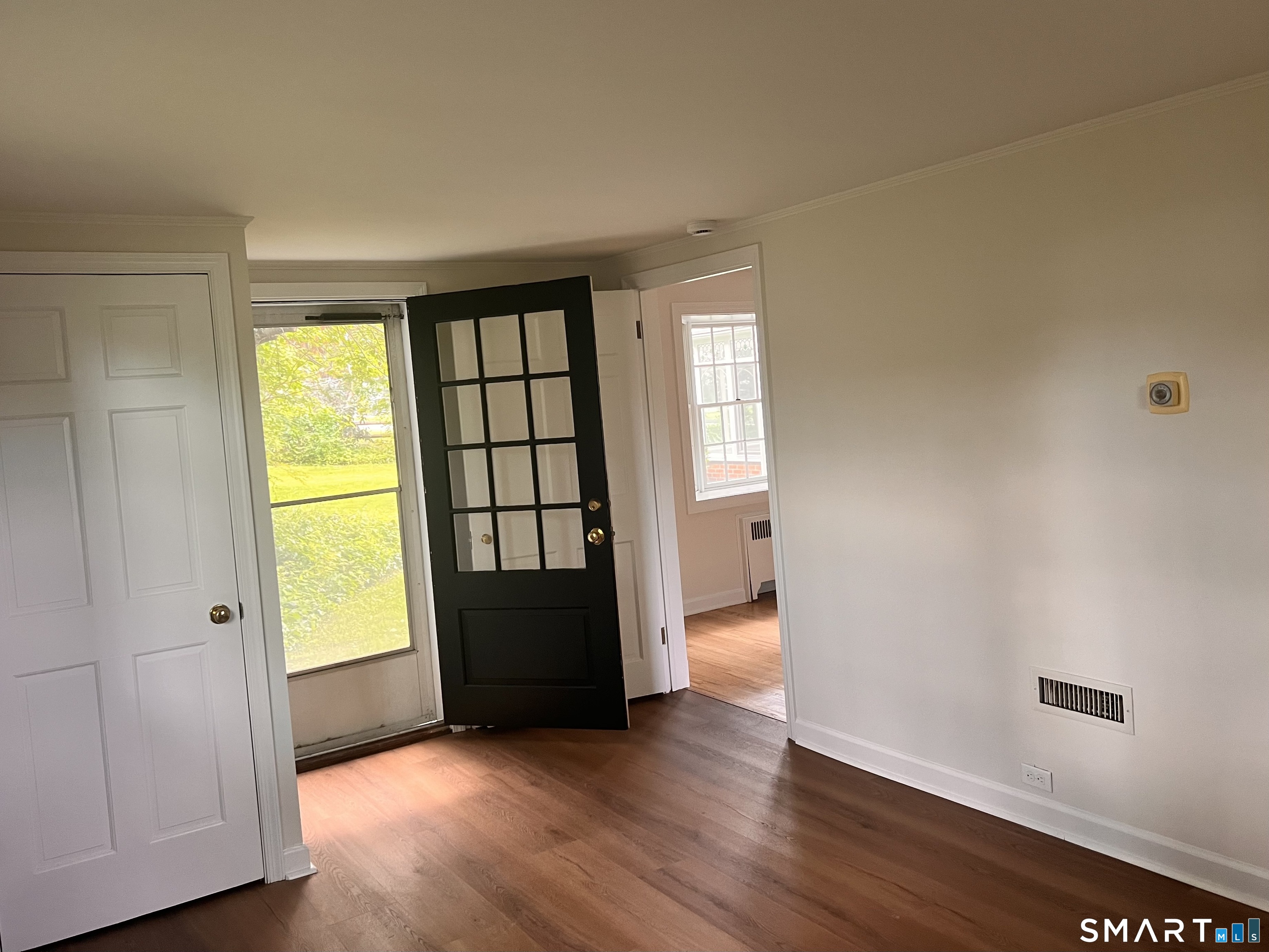 23 Norway Road North Haven, CT 06473 - Photo 19 of 32 an empty room with wooden floor and windows