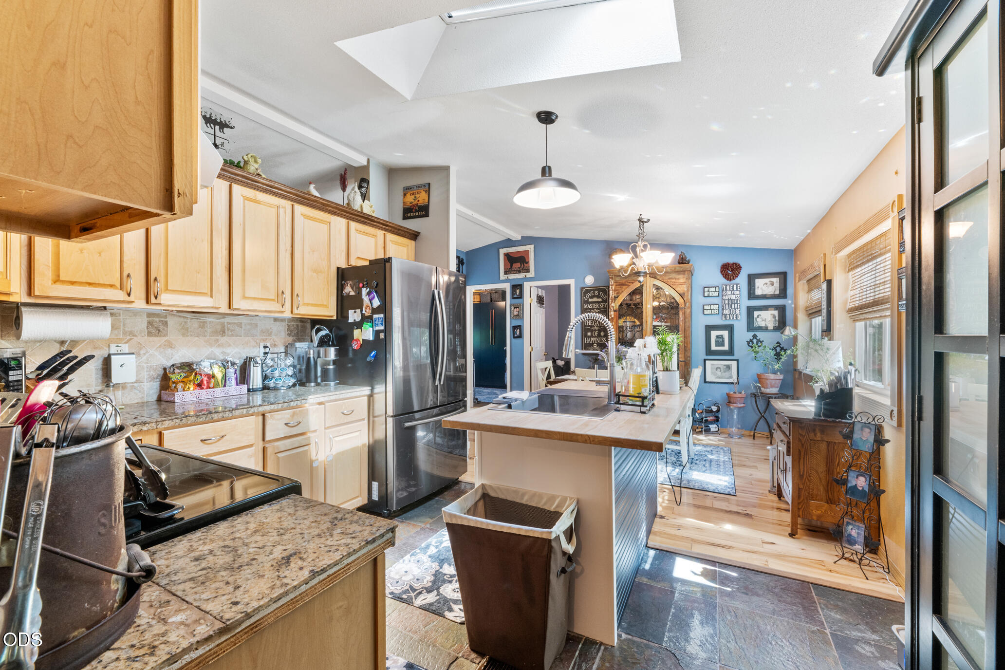 690 Foots Creek Road Gold Hill, OR 97525 - Photo 16 of 45 a kitchen that has a lot of cabinets and refrigerator in it