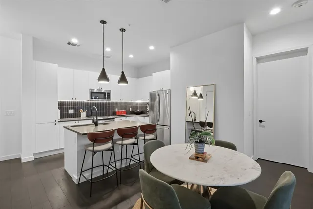 a table and chairs in a kitchen