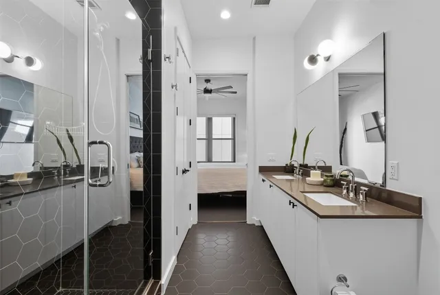 a kitchen with a sink stove and refrigerator