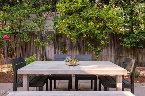 a view of a table and chairs in patio