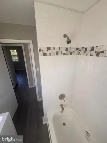 a bathroom with a bathtub