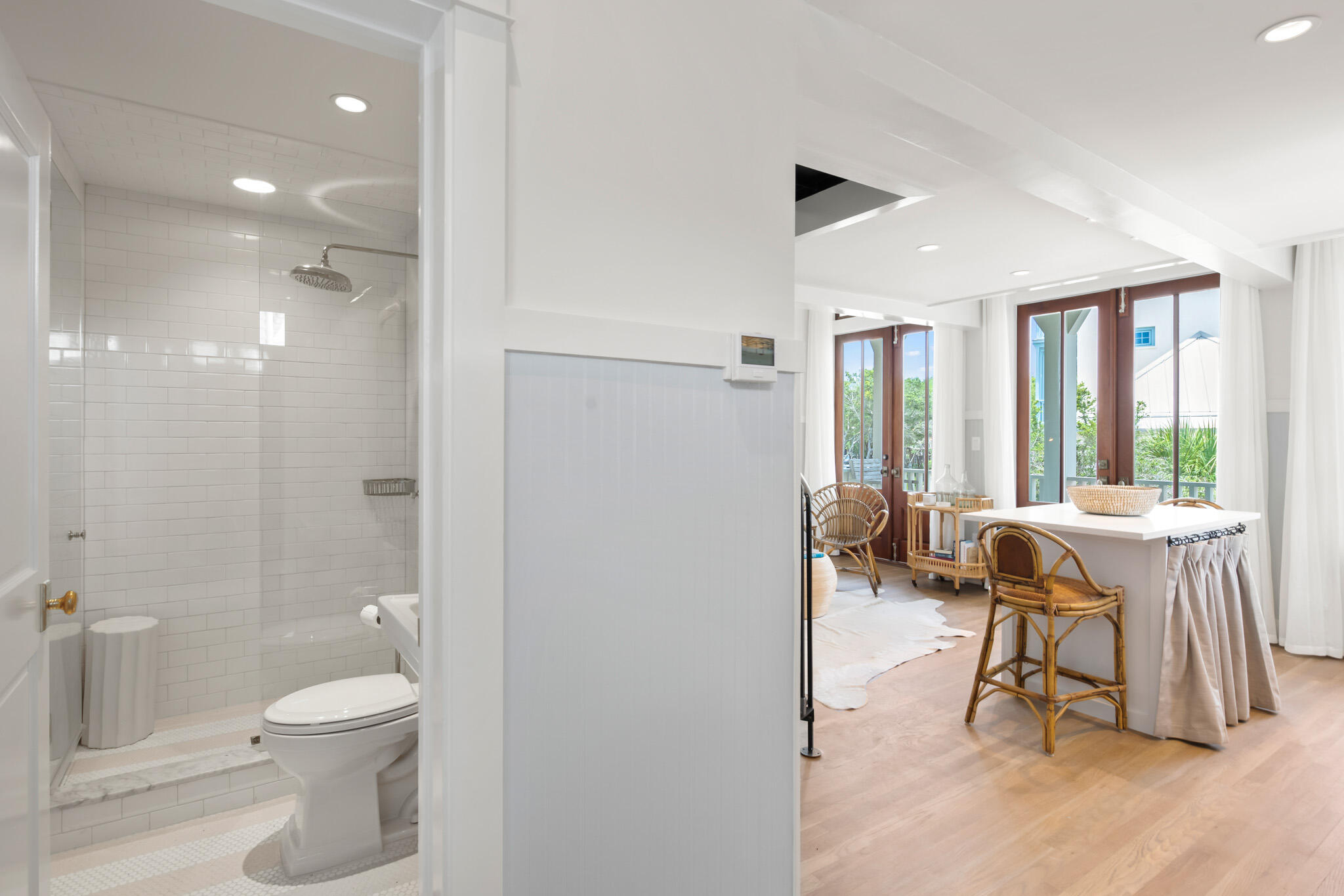 84 Windward Lane Inlet Beach, FL 32461 - Photo 55 of 67 a bathroom with a toilet a sink and a large mirror