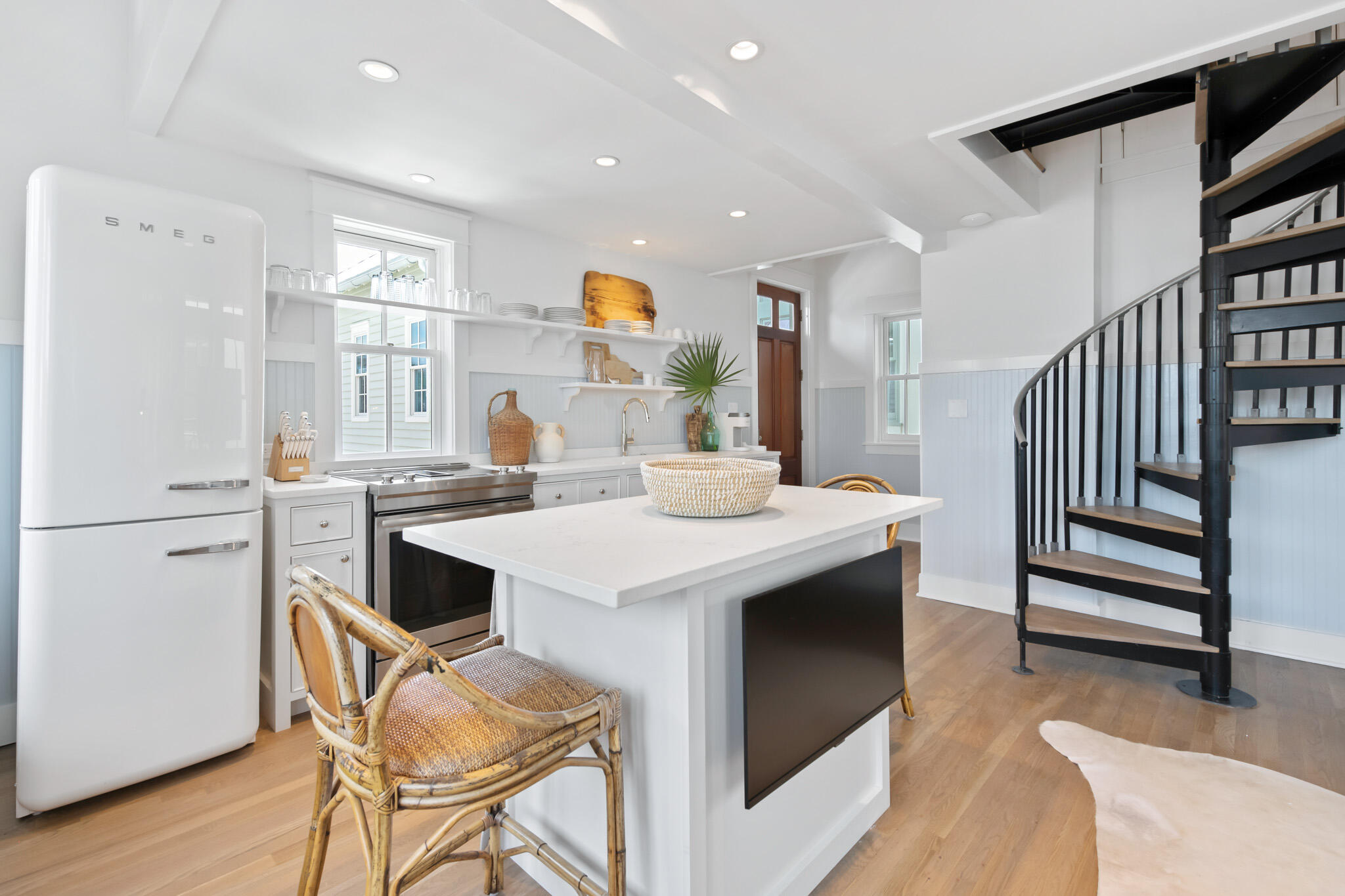 84 Windward Lane Inlet Beach, FL 32461 - Photo 59 of 67 a kitchen that has a sink a stove and chairs