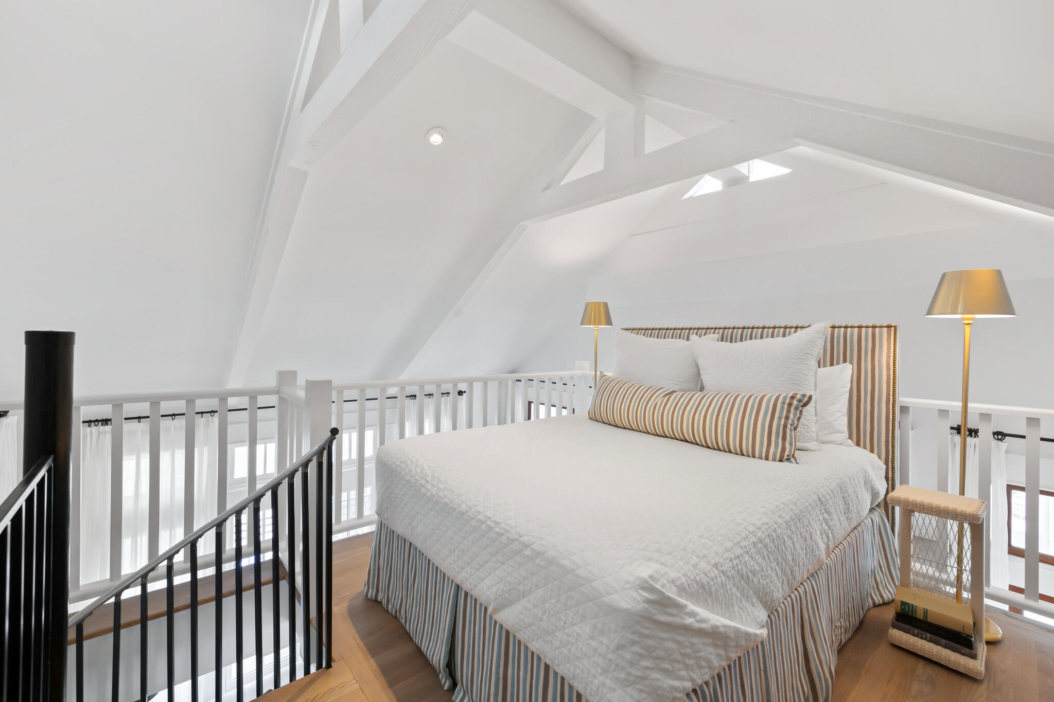 84 Windward Lane Inlet Beach, FL 32461 - Photo 63 of 67 a bedroom with a bed and a chandelier