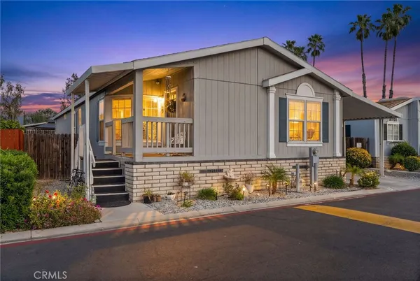 a view of a house with a street