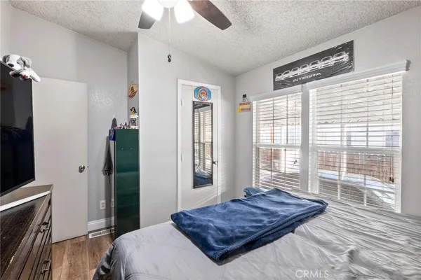a bedroom with a bed and a walk in closet