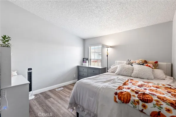 a bathroom with a sink vanity mirror and toilet