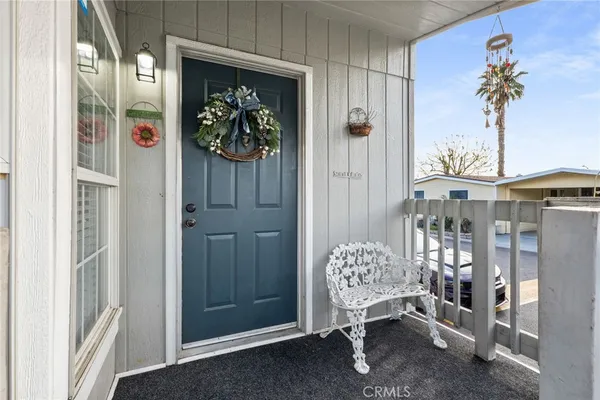 a living room with furniture or couch and a flat screen tv