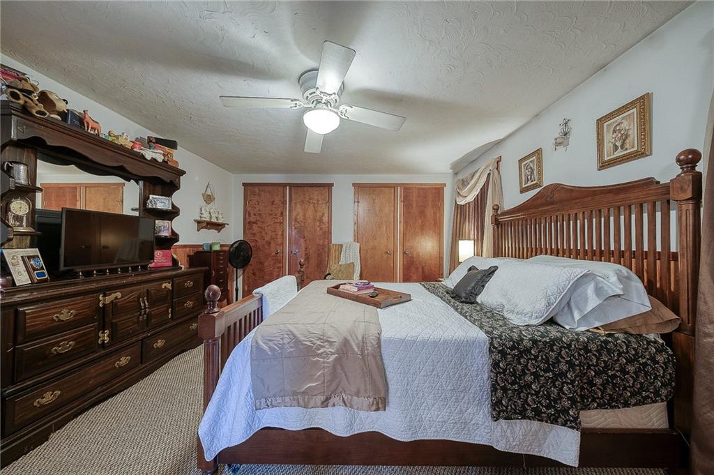 148-149 Soaring Eagle Sarver, PA 16055 - Photo 16 of 20 a bedroom with a bed and a flat screen tv