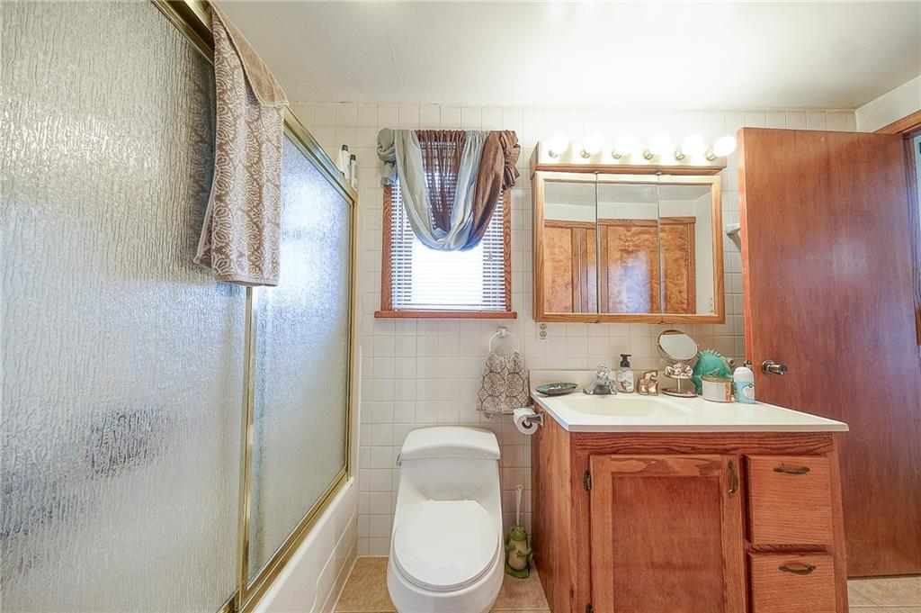 148-149 Soaring Eagle Sarver, PA 16055 - Photo 17 of 20 a bathroom with a toilet sink and mirror