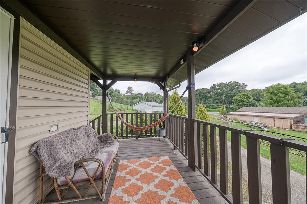 148-149 Soaring Eagle Sarver, PA 16055 - Photo 20 of 20 a view of a chair and tables in the balcony