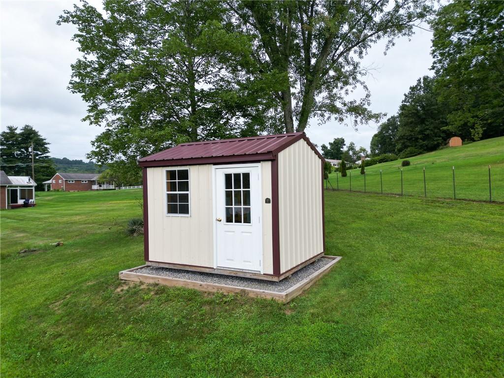 148-149 Soaring Eagle Sarver, PA 16055 - Photo 3 of 20 a view of a white house with a big yard and large trees