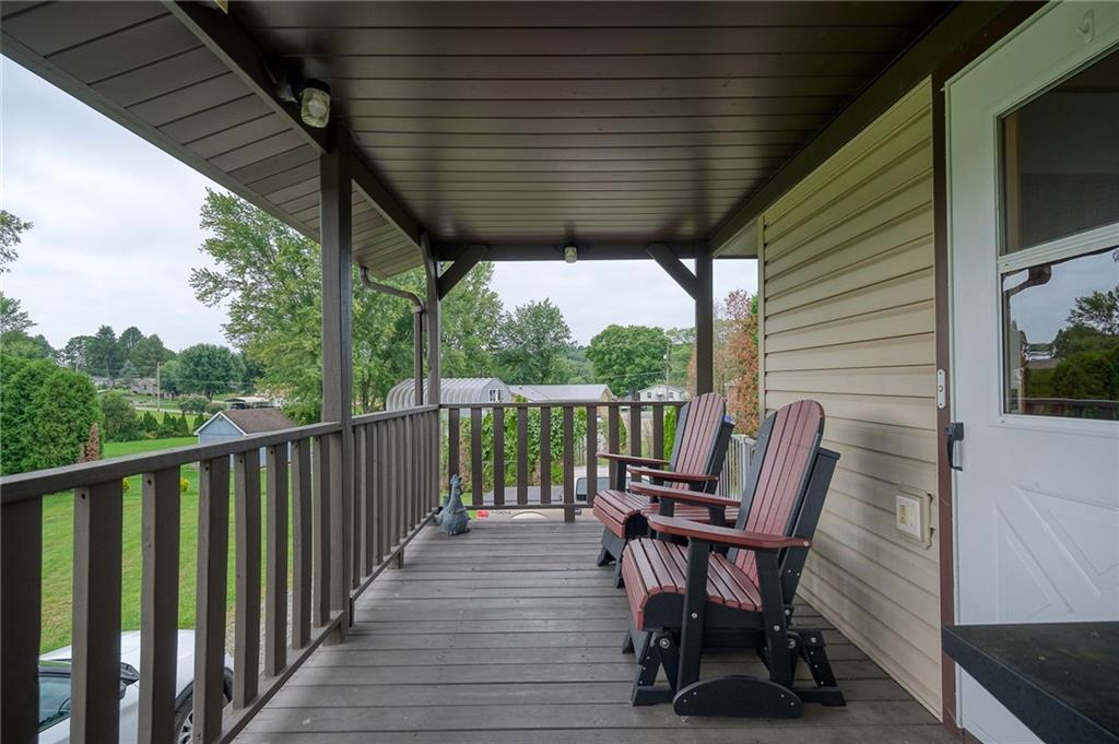 148-149 Soaring Eagle Sarver, PA 16055 - Photo 5 of 20 a view of chair in wooden deck