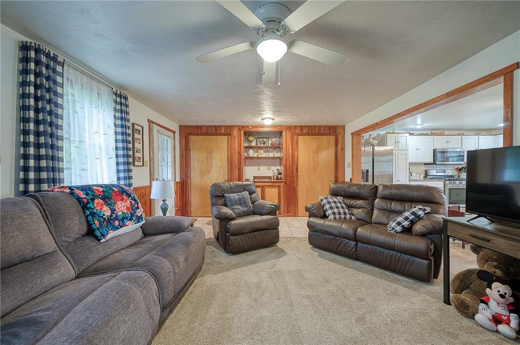 148-149 Soaring Eagle Sarver, PA 16055 - Photo 8 of 20 a living room with furniture and a flat screen tv