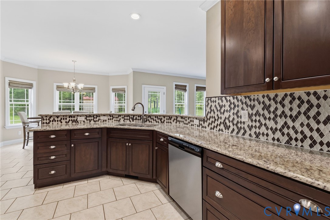 15220 River Road Chesterfield, VA 23838 - Photo 12 of 65 Kitchen featuring dark wood cabinetry, light-toned