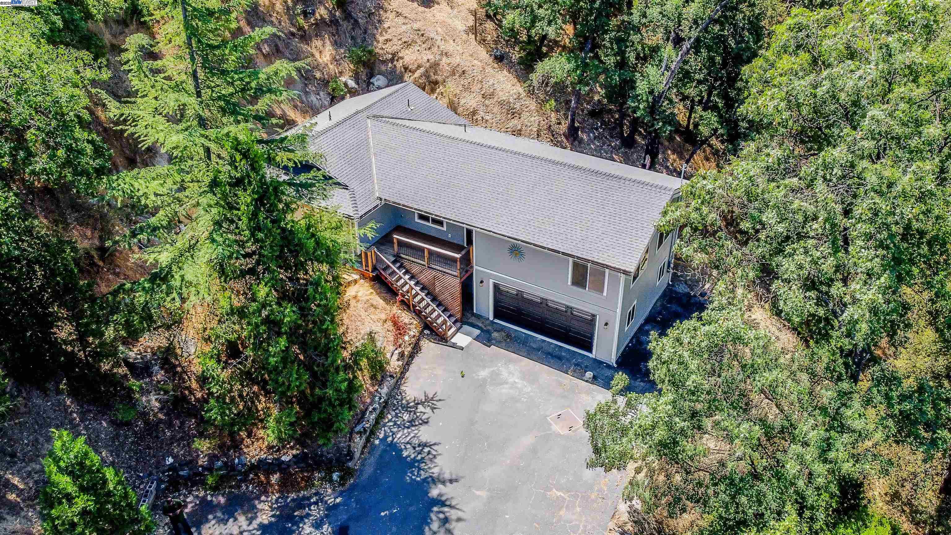 21451 Phoenix Lake Road Sonora, CA 95370 - Photo 1 of 1 a view of a house with a yard and plants